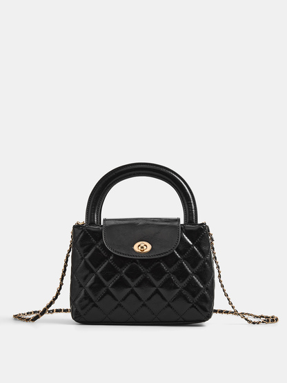 Quilted Turn Lock Top Handle Handbag