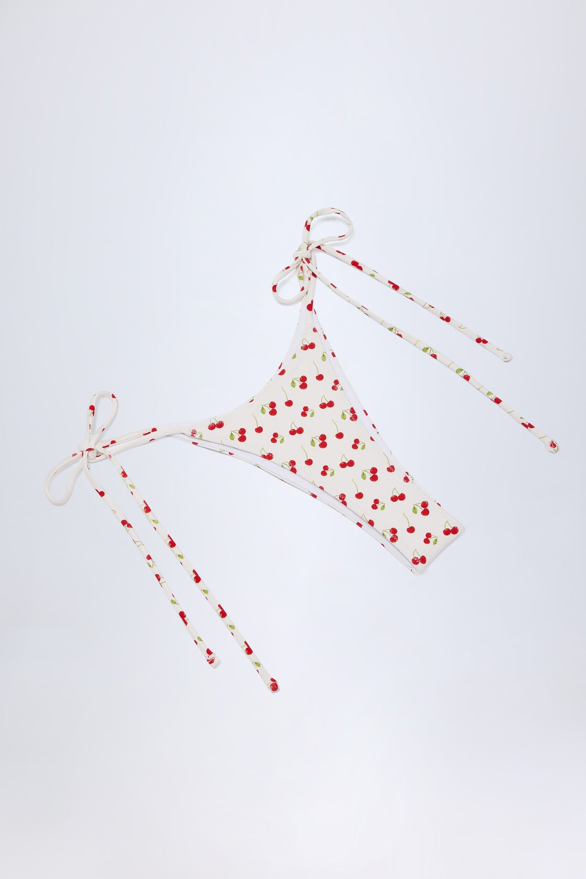 Side-Tie Cheeky Bikini Bottoms in Cherry Print